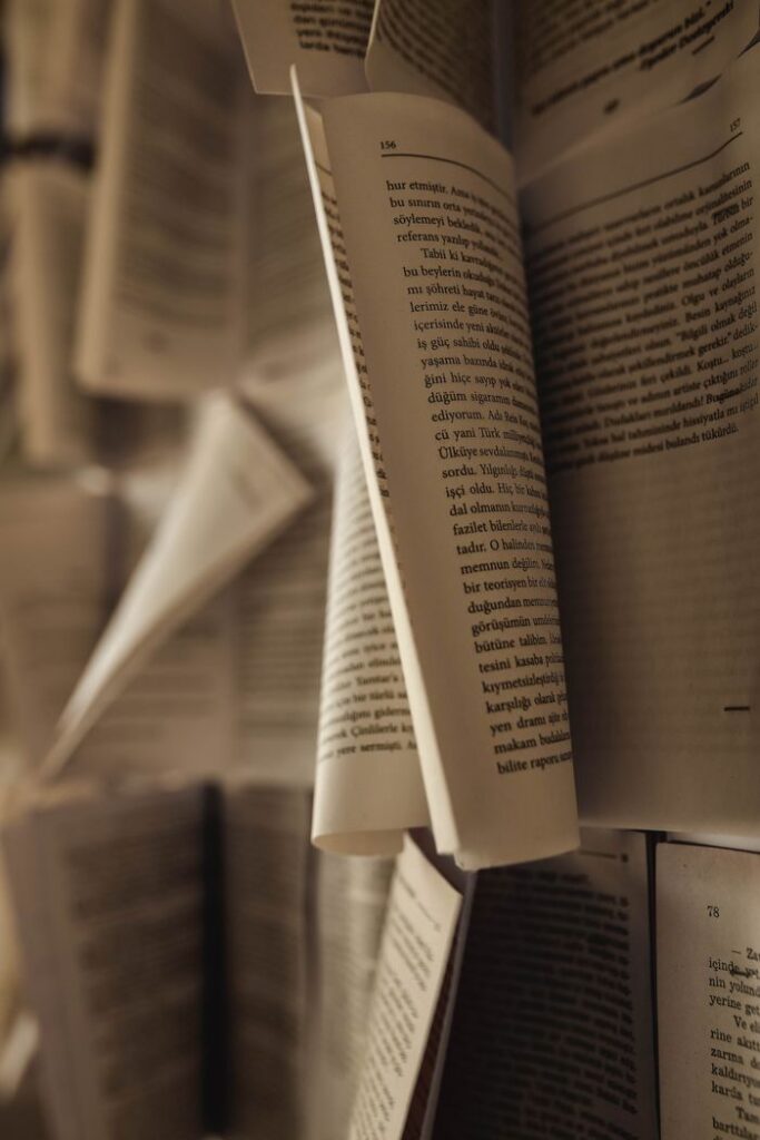 pexels photo 9247613 9247613 Artistic close-up of open book pages in motion, highlighting the texture and depth of paper.